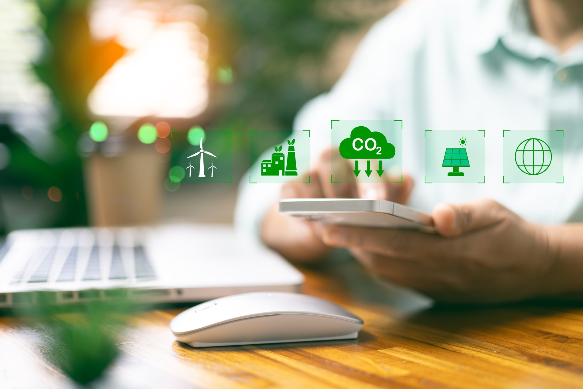 Reduce CO2 emission concept with icons. women using laptop for working technology and business Net zero and carbon neutral. Renewable energy-based green businesses can limit climate change.